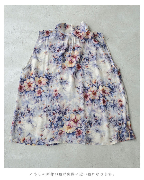 後ろで揺れるリボンの花画シフォンブラウストップス