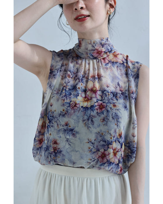 後ろで揺れるリボンの花画シフォンブラウストップス