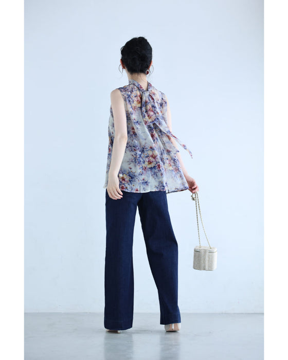 後ろで揺れるリボンの花画シフォンブラウストップス