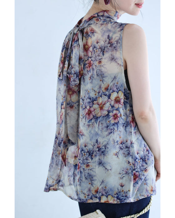 後ろで揺れるリボンの花画シフォンブラウストップス