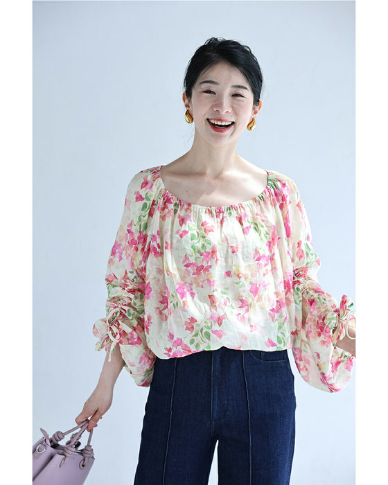 愛らしいピンクの花咲くシャーリング袖ブラウストップス