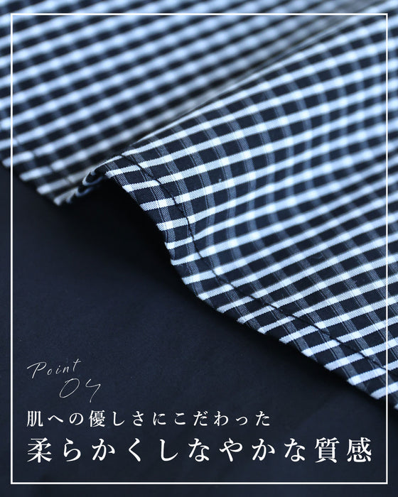ゆったり広がる重ね着風チェックロングワンピース