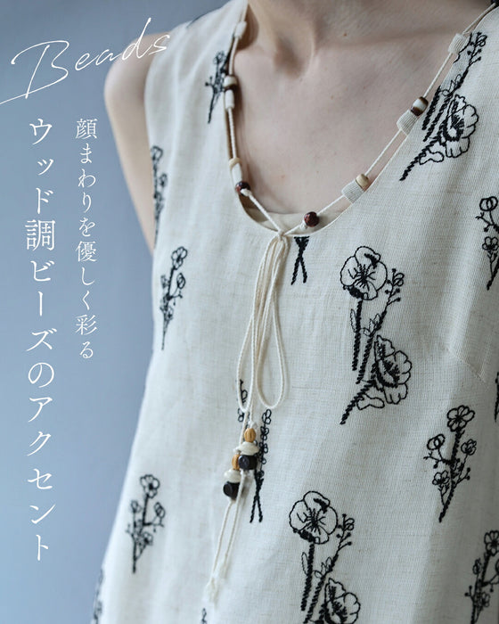 ウッドビーズ揺れる花刺繍ロングワンピース