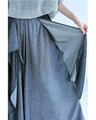 優雅に揺れるレイヤードドレープのワイドフレアパンツ