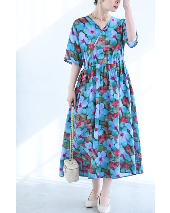 鮮やかな花に包まれる水彩画ミディアムワンピース