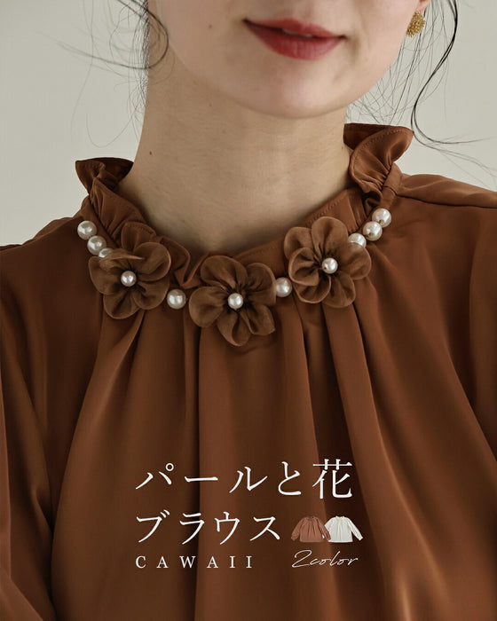寄り添うパールと花のブラウストップス