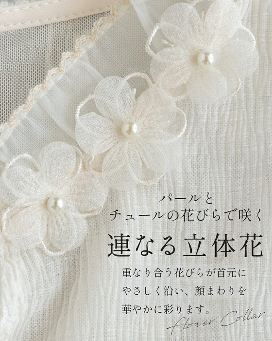白花咲く陽だまりブラウストップス