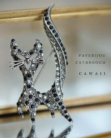  Sparkling bejeweled cat brooch