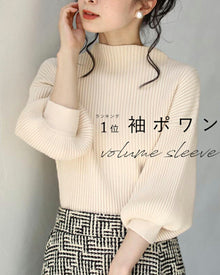  Knit top with puffed sleeves and off-neck puffed sleeves