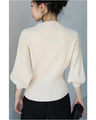 Knit top with puffed sleeves and off-neck puffed sleeves
