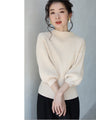 Knit top with puffed sleeves and off-neck puffed sleeves