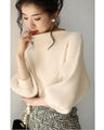 Knit top with puffed sleeves and off-neck puffed sleeves