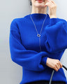 Long sleeve puffy and off-neck knit top