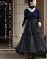 A turtleneck knit top with beautifully transparent lace on the shoulders and sleeves