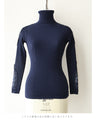 A turtleneck knit top with beautifully transparent lace on the shoulders and sleeves