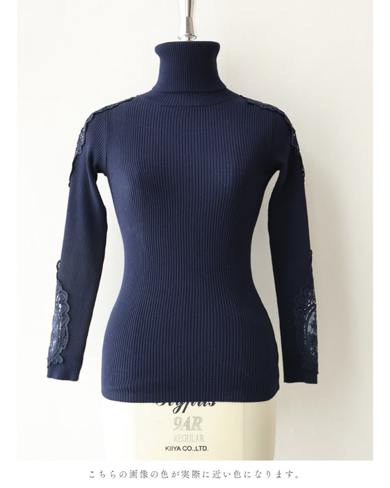 A turtleneck knit top with beautifully transparent lace on the shoulders and sleeves