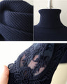 A turtleneck knit top with beautifully transparent lace on the shoulders and sleeves