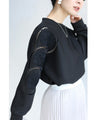 Glossy pullover top with floral relief sleeves