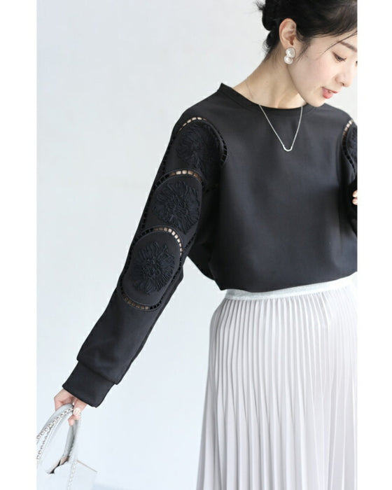 Glossy pullover top with floral relief sleeves