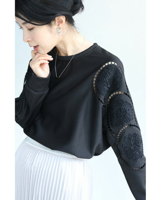 Glossy pullover top with floral relief sleeves