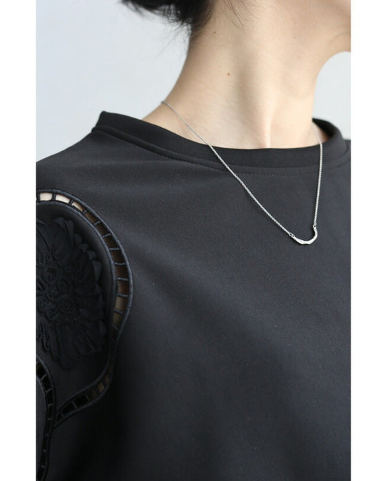 Glossy pullover top with floral relief sleeves