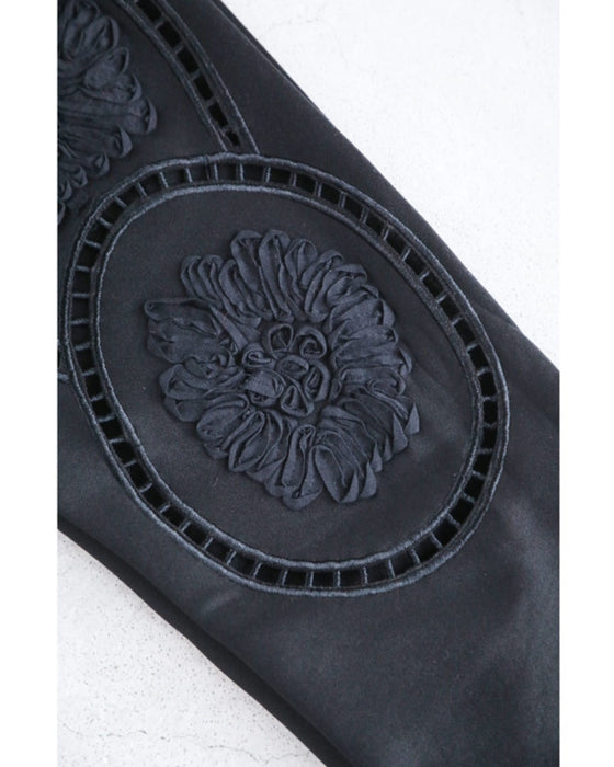 Glossy pullover top with floral relief sleeves