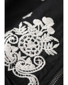 花刺繍を散りばめたペプラムブルゾン