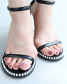 Heeled sandals with pearl stones all around