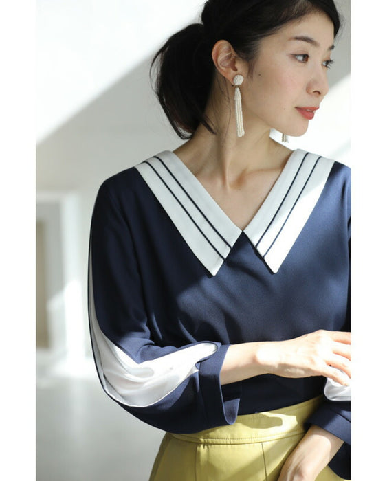 スリット袖から覗くベールの上品ブラウストップス