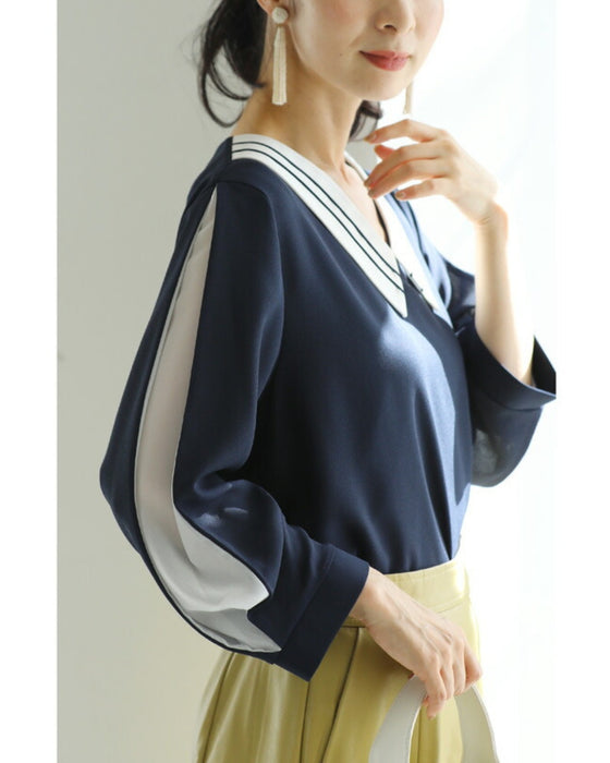 スリット袖から覗くベールの上品ブラウストップス