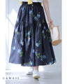 A fluffy mid-length skirt with a lovely blue flower design