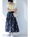 A fluffy mid-length skirt with a lovely blue flower design