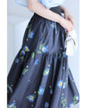 A fluffy mid-length skirt with a lovely blue flower design