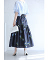 A fluffy mid-length skirt with a lovely blue flower design