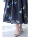 A fluffy mid-length skirt with a lovely blue flower design