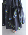 A fluffy mid-length skirt with a lovely blue flower design