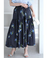 A fluffy mid-length skirt with a lovely blue flower design