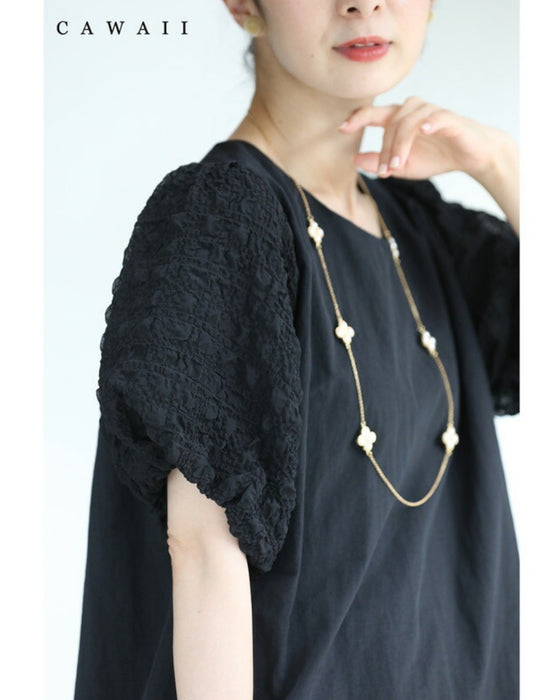 ぽこぽこ浮き立つ柄のふんわり袖Aラインチュニック