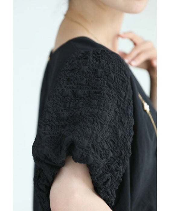 ぽこぽこ浮き立つ柄のふんわり袖Aラインチュニック