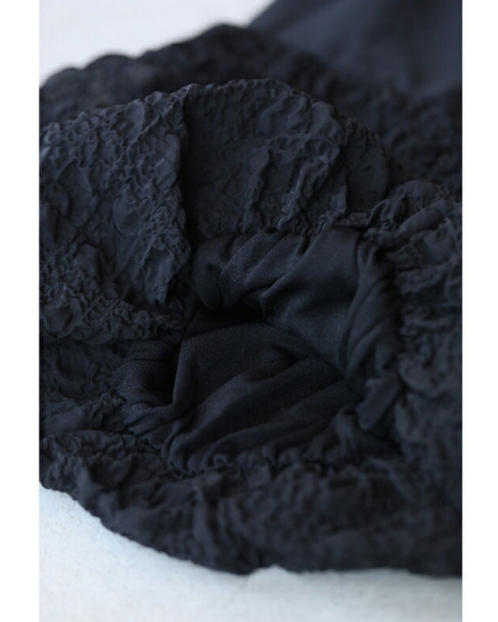 ぽこぽこ浮き立つ柄のふんわり袖Aラインチュニック