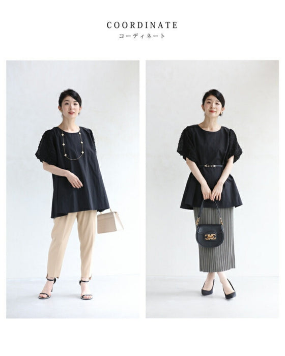 ぽこぽこ浮き立つ柄のふんわり袖Aラインチュニック