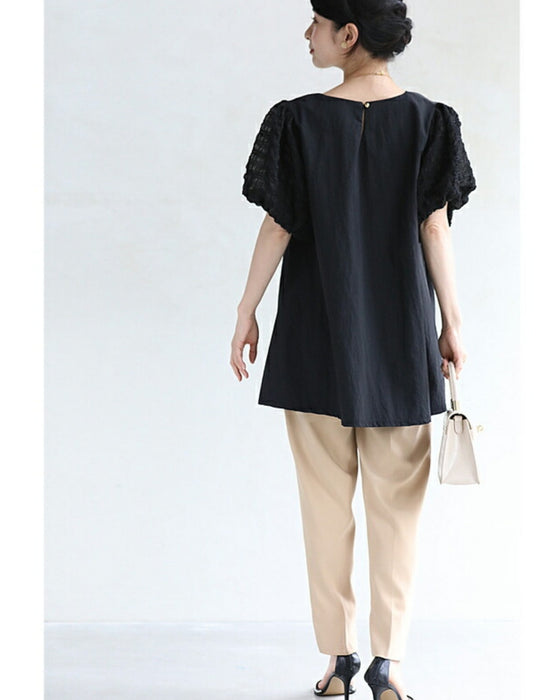 ぽこぽこ浮き立つ柄のふんわり袖Aラインチュニック