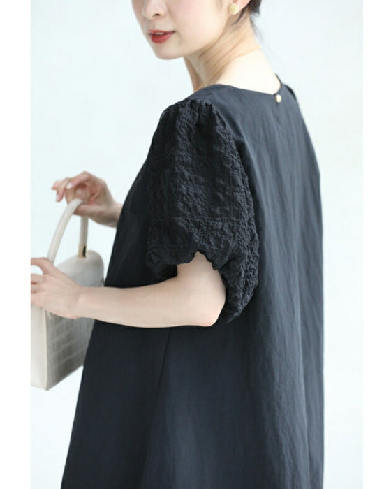 ぽこぽこ浮き立つ柄のふんわり袖Aラインチュニック