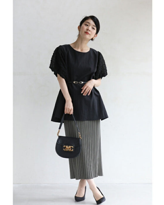 ぽこぽこ浮き立つ柄のふんわり袖Aラインチュニック