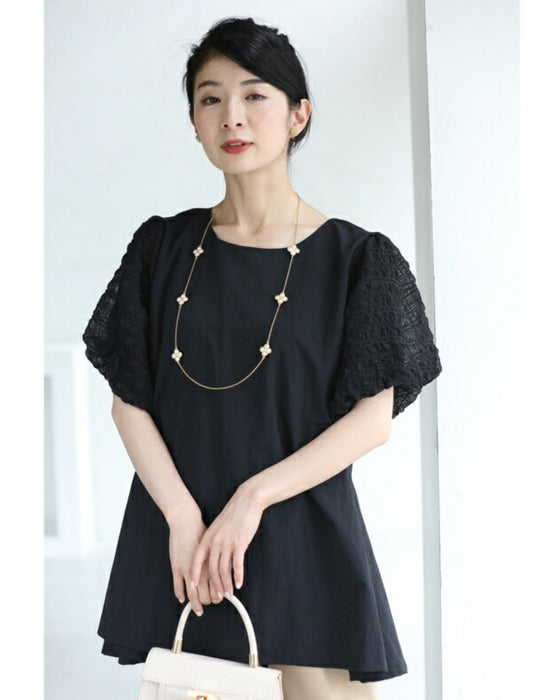 ぽこぽこ浮き立つ柄のふんわり袖Aラインチュニック