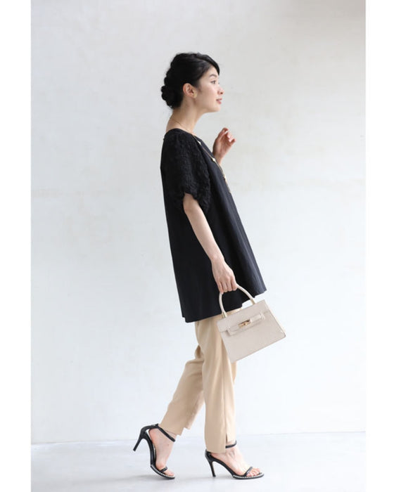 ぽこぽこ浮き立つ柄のふんわり袖Aラインチュニック