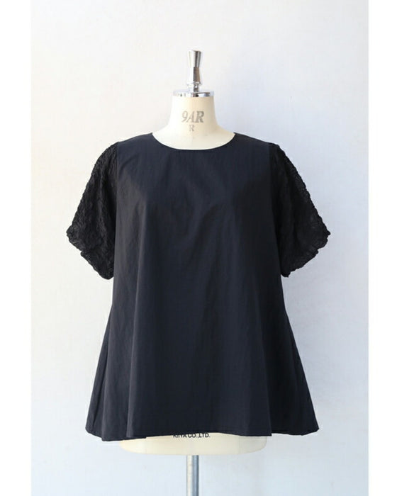 ぽこぽこ浮き立つ柄のふんわり袖Aラインチュニック