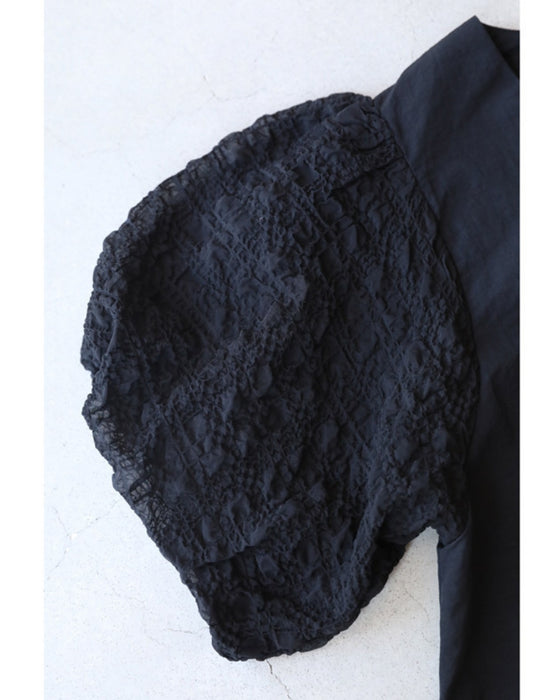 ぽこぽこ浮き立つ柄のふんわり袖Aラインチュニック