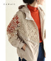 A light jacket with a hood made of beautiful cutwork lace