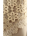 A light jacket with a hood made of beautiful cutwork lace